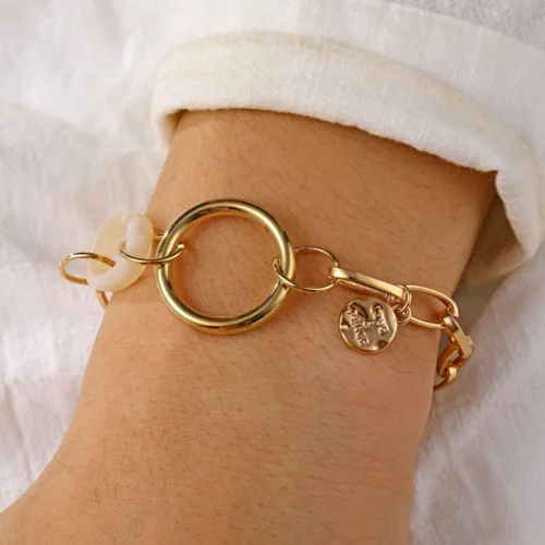 Monica Celebrate every moment! This simple bracelet with delicate details can be worn in the form of a <strong>lock</strong> and <strong>key</strong>! It's also a <strong>perfect gift</strong> for that special person in your life. Since our jewelry is made of <strong>high quality</strong> stainless steel, this product will last longer than others. <ul> <li>Made of <strong>premium-quality</strong> stainless Steel, it won't tarnish!</li> <li>The bracelet is 17 cm long & <strong>not adjustable</strong></li> </ul>